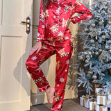 Conjunto de pijama de saten con ribetes en contraste y estampado navideno