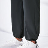 Pantalones deportivos con bolsillo lateral con solapa de cintura con cordon cargo