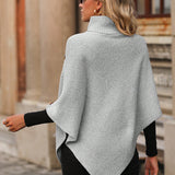 Sueter poncho cuello alto con diseno de boton