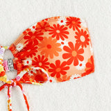 Top bikini bandeau con estampado floral vinculado con aro