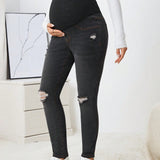 Jeans Ajustados De Mezclilla Gris Profundo De Moda Para Embarazadas Con Cinturilla De Alta Elasticidad, Panel De Punto Y Detalle Rasgado