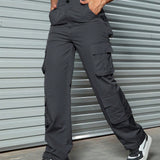 Pantalones cargo calle con estampado de camuflaje con bolsillo lateral con solapa