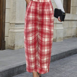 LUNE Pantalones con estampado de cuadros con bolsillo oblicuo