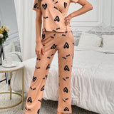 Conjunto De Pijama Para Mujer De Manga Corta Con Estampado De Corazones Y Pantalones Envolventes