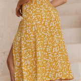 Falda midi de muslo con abertura floral