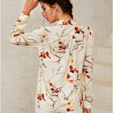 Blusa con estampado floral de cuello notch