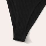 Negro / L Body ringer tejido de canalé con bordado de letra