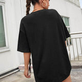 Negro / M Camiseta de hombros caídos con estampado de letra