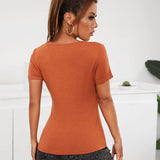 Naranja Quemada / S Camiseta unicolor escote V