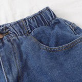 Shorts jean bajo de doblez con lavado