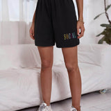 Negro / XL Shorts track con bordado de letra