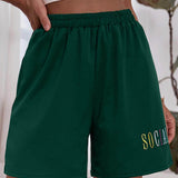 Verde Oscuro / S Shorts track con bordado de letra